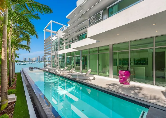Indulge In Waterfront Elegance Your Ultra Luxury Miami Beach Estate Beckons!